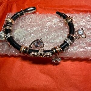 Elegant Black Leather Charm Bracelet with Gold & Rhinestone Accents